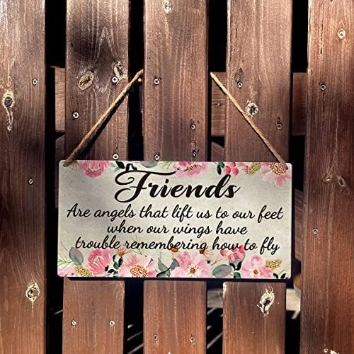 Sinal de amizade, amigos de fazenda significativos são anjos que nos levantam aos pés de madeira,