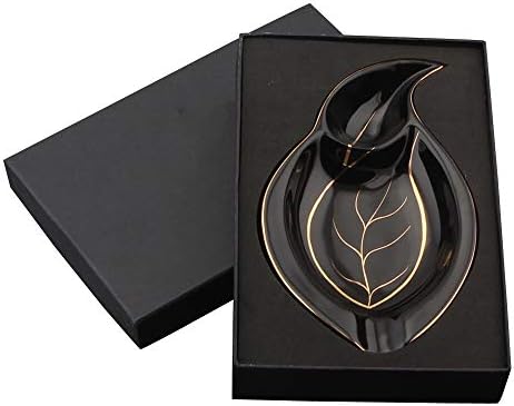 Walnuta Creative Leaf em forma de folha cinzeira com material de cerâmica preta, usada na sala de estar e em decoração