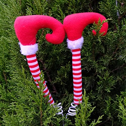 Idyllic Christmas colhe as pernas elfas colheita de bota de ouro listrado, decorações festivas e caprichosas ornamentos