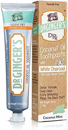 O creme dental de óleo de coco do Dr. Ginger com carvão vegetal ativado branco, potência de